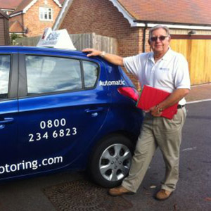 Driving Instructor Reading Automatic Car
